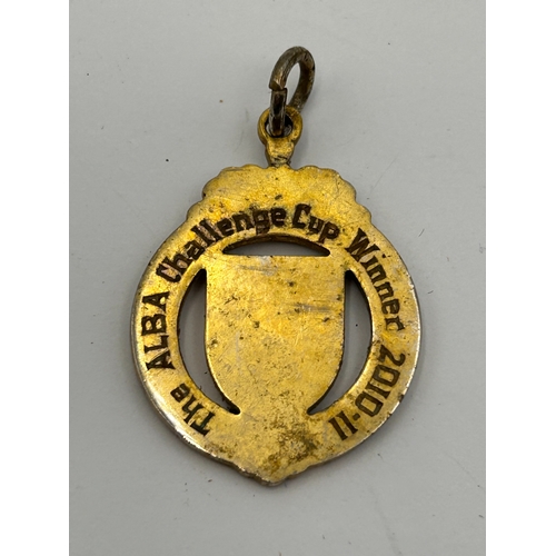 112 - A Collection of Eight Vintage English and Scottish Football League Medallions and Fobs