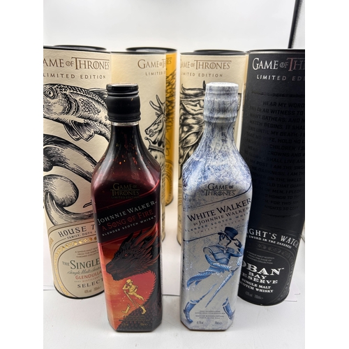 25 - A Collection of 11 Johnnie Walker and Single Malt Game of Thrones Limited Edition Scotch Whiskies