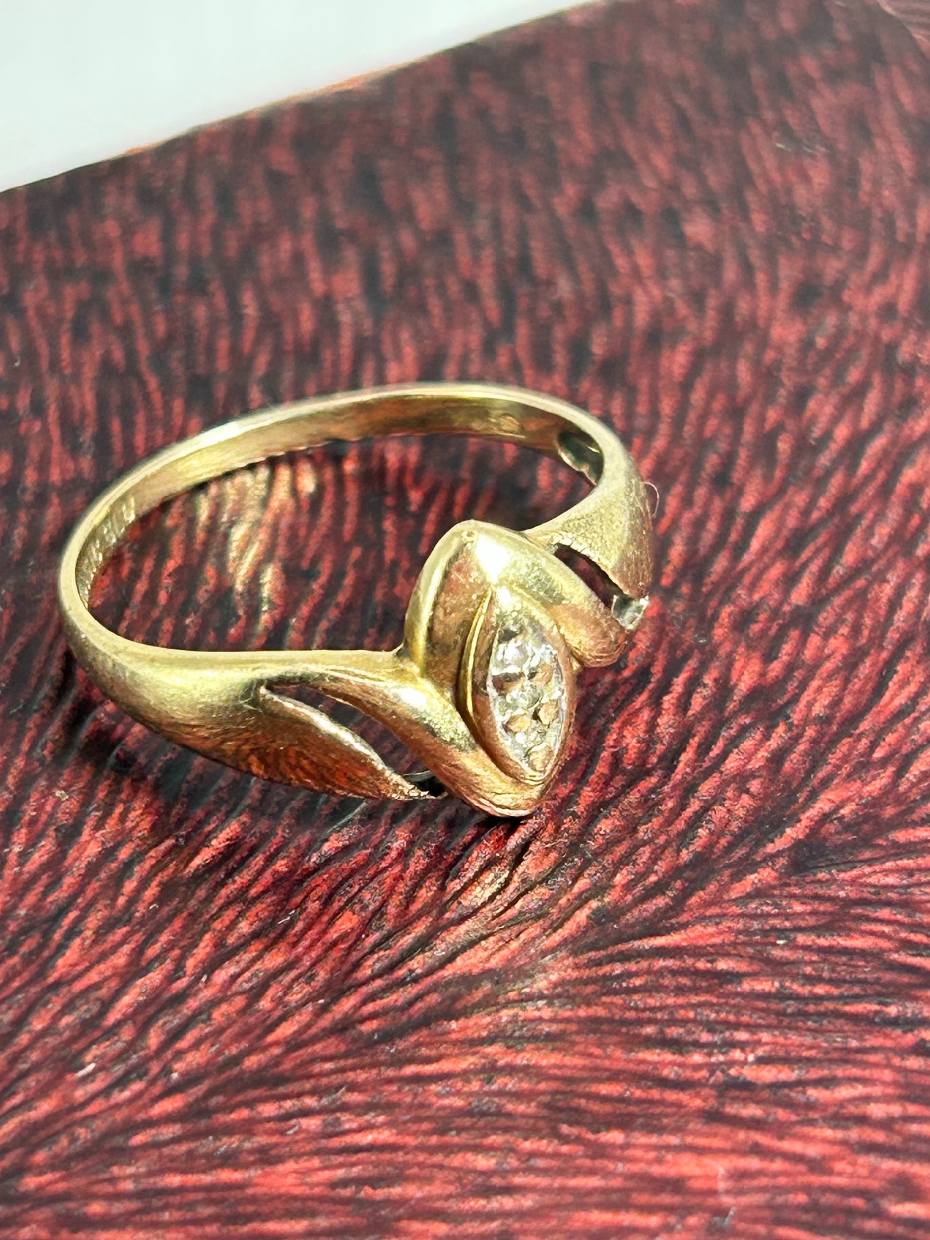A Magic Glo 9ct Yellow Gold and Diamond Bypass Ring 1.4g