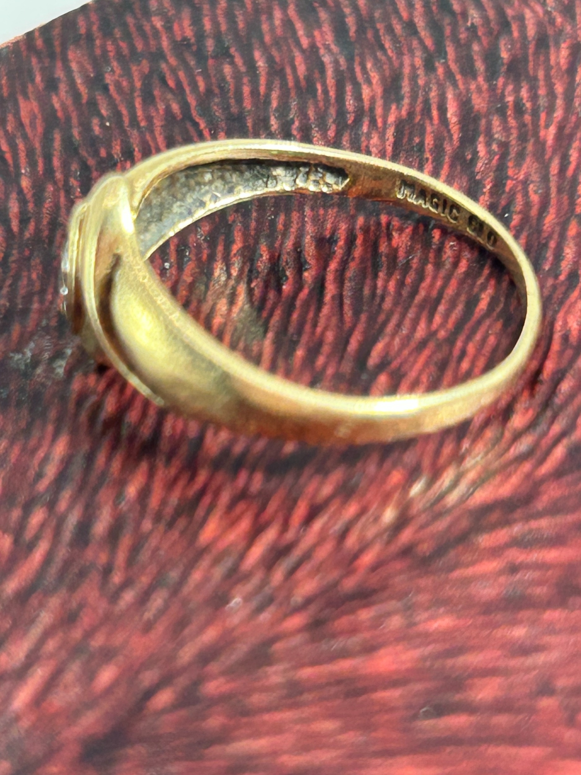 A Magic Glo 9ct Yellow Gold and Diamond Bypass Ring 1.4g