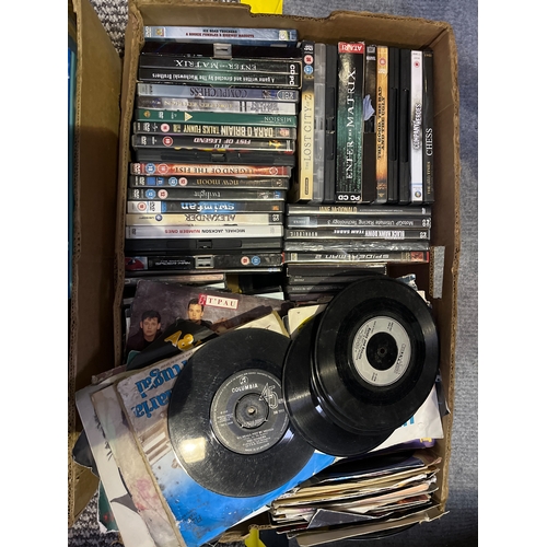 An Assortment of Vinyl Records, DVDs, PC Software, and Books