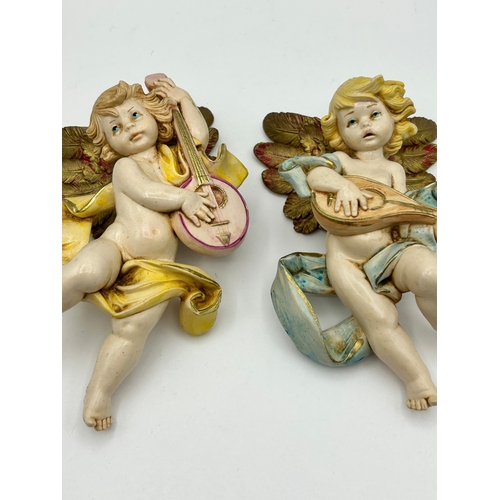 A Pair of Fontanini Simonelli Musical Cherub Wall Plaques