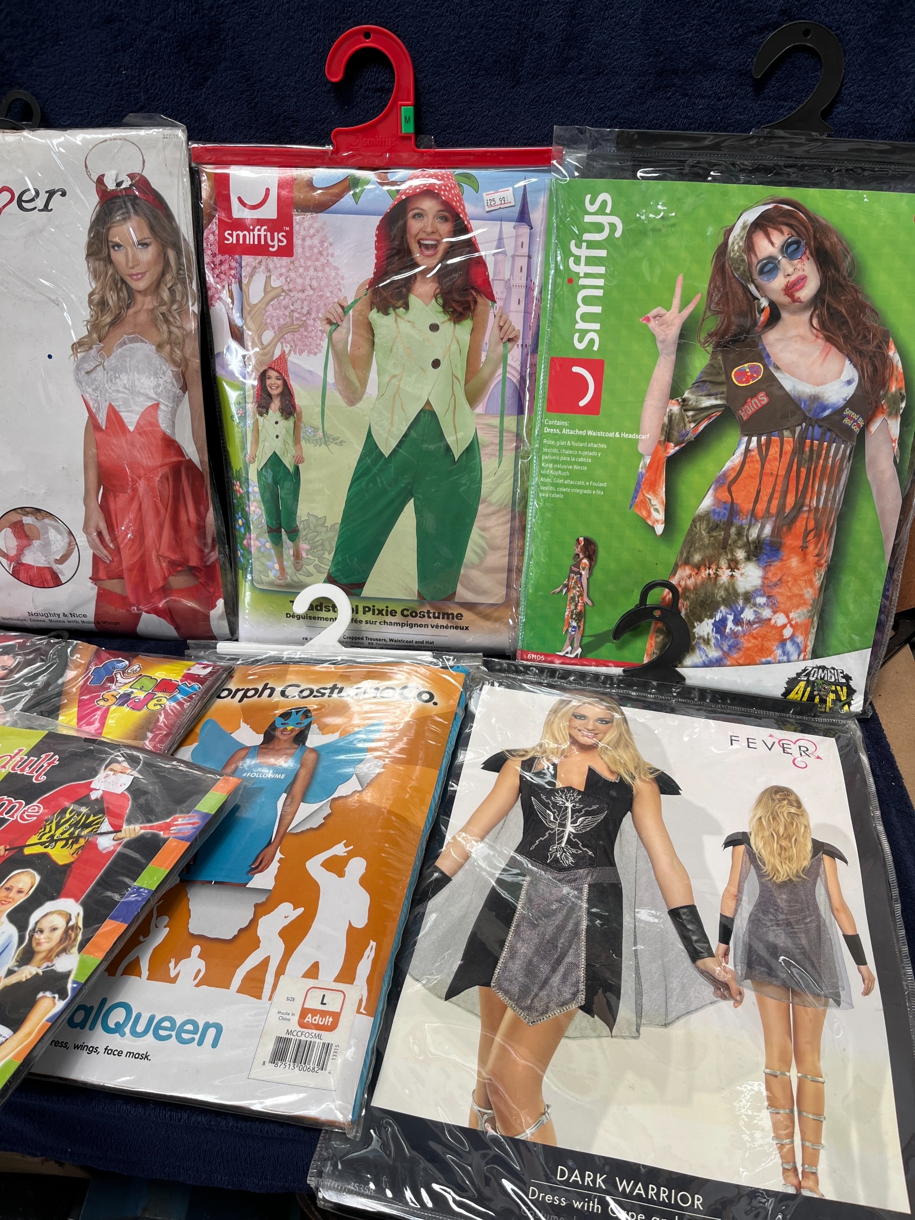 A Collection of Adult Fancy Dress Costumes by Smiffys, Fever, and Morph ...