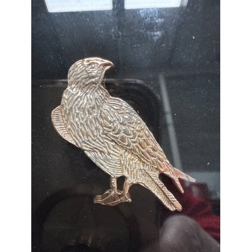 16 - A Framed Decorative Metal Relief Depicting a Bird