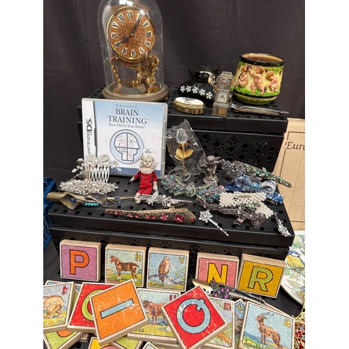 26 - A Collection of Vintage and Modern Collectibles Including Militaria, Decorative Ceramics, and Jewell... 