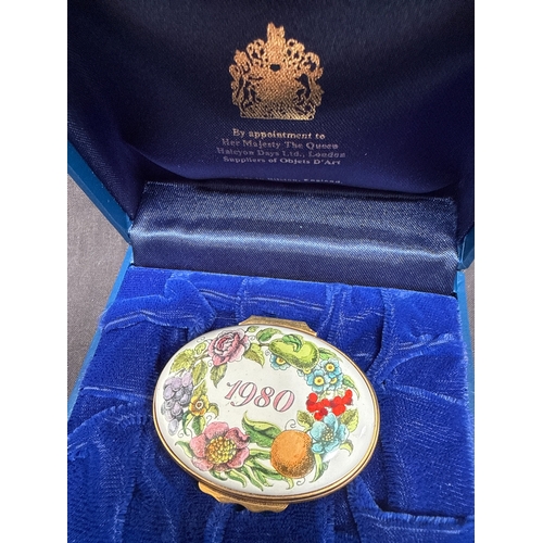 33 - A Trio of Halcyon Days Annual Commemorative Enamel Boxes