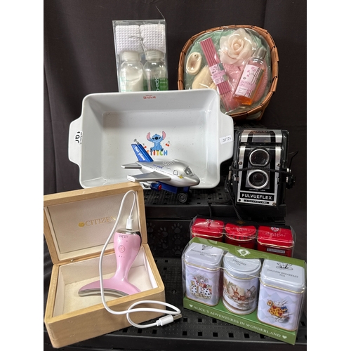 45 - An Assortment of Household Goods and Collectibles including a Fulvueflex Camera and Disney Stitch Ce... 