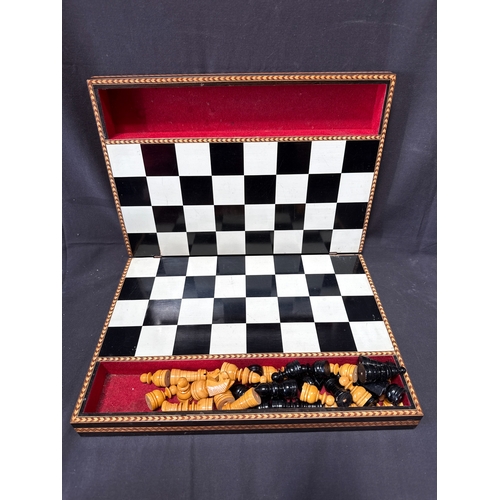 58 - A Large Middle Eastern Style Marquetry Inlaid Wooden Folding Chess Set