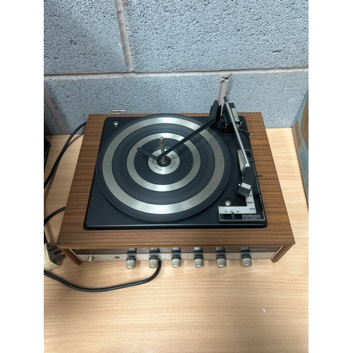 Two Vintage Integrated Stereo Turntable Systems
