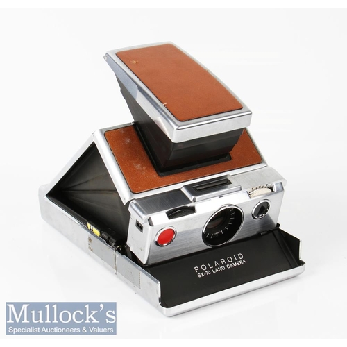 59 - Polaroid SX-70 land camera with original leather grip inserts appears with some signs of wear, signs... 