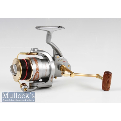 104 - Mitchell 300X Pro Spinning Reel & Spare Spool with gold finish fittings and turned wood handle, comp... 