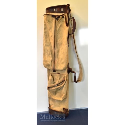 135 - Marked Leyland rigid canvas and leather golf club carry bag complete with travel hood and ball pocke... 