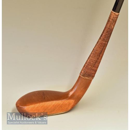 187 - Auchterlonie of St Andrews wide head late longnose putter in light stained persimmon c1895 fitted wi... 