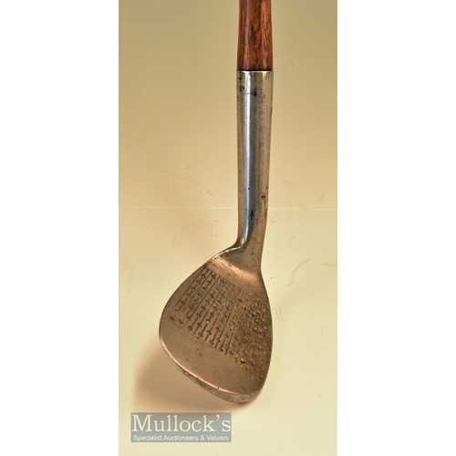 21 - Tom Auchterlonie St Andrews Pat It-Z-it-In flange sole rustless niblick with multi line and dot cent... 