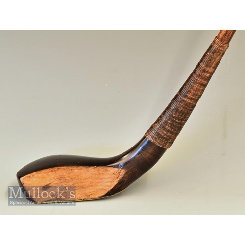 229 - T Dunne narrow wide head dark stained baffing spoon c1880 fitted with full brass sole plate stamped ... 