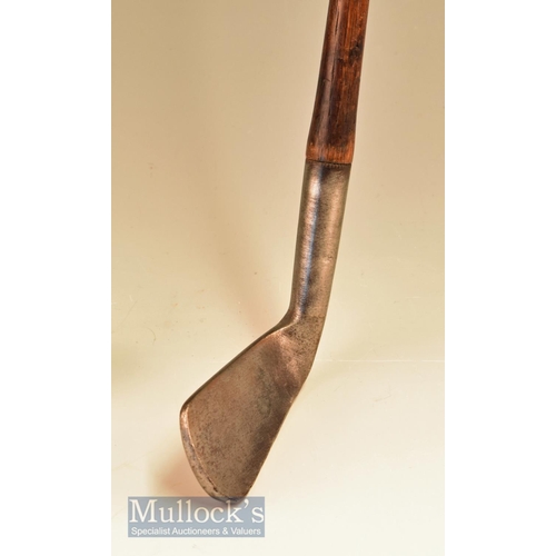 56 - Rare Bussey patent steel socket mid iron with concave face, fitted with replaced grip