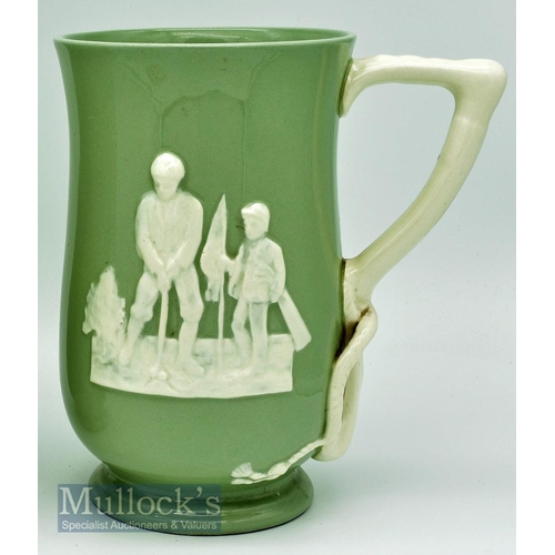 165 - Spode Copeland Golfing Tankard: green tankard with white relief golfing figures and handle, height 1... 