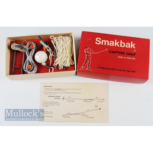 150 - SmakBak Captive Golf - Golf Practice aid within original red box, ball, two pegs, string and rubber ... 