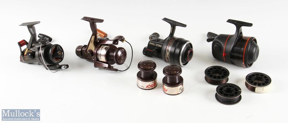 Selection of fishing reels featuring a Browning 9506 spinning reel with 2x  spare spools, a Shimano 2