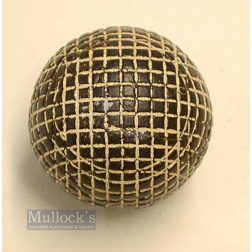 127 - The Silver Town Moulded mesh guttie golf ball - in good round condition with minor strike marks and ... 