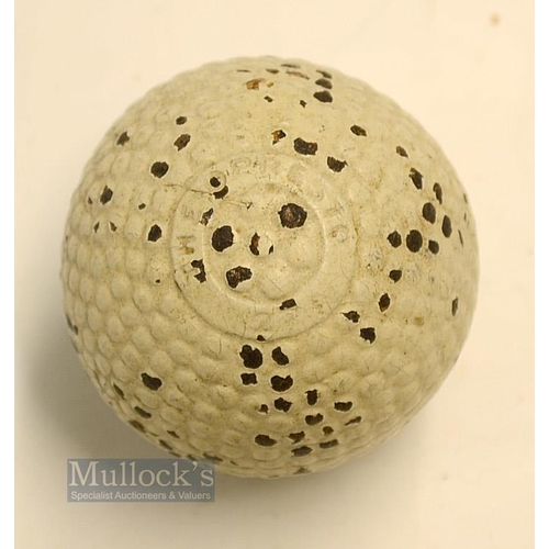 134 - The Opresto 27 ½ bramble pattern guttie golf ball - in unused condition showing most of the original... 