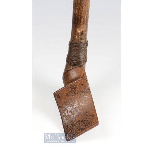 678 - 19thc Flemish/French Chloe iron club and wooden ball - fitted with the original thickened wrapped le... 