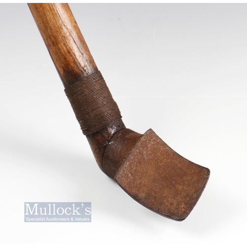 679 - 19thc Flemish/French Chloe iron club and wooden ball - fitted with thick corded grip c/w oval white ... 