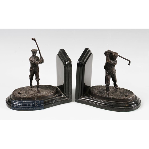 700 - Pair of Bronze Golf Book ends marked 'G Reese 05' with two matching golfing figures, on marble base,... 