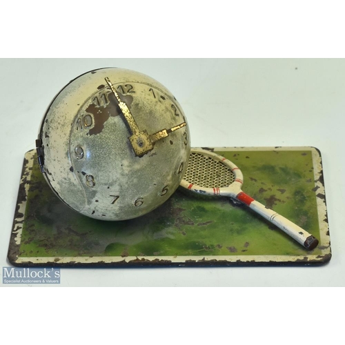 1037 - Clockwork Tennis Ball Clock and Racket, this is for repair only as its clockwork mechanism is not wo... 