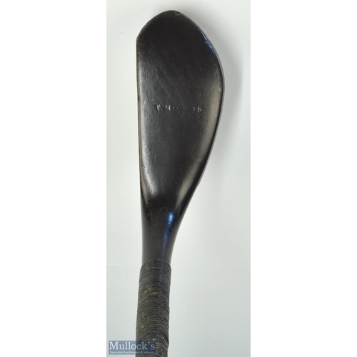 602 - Fine Tom Morris dark stained beech wood longnose putter c1875 with an angled neck back ridge above t... 