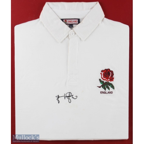 369a - Johnny Wilkinson Signed England Rugby Shirt, a replica shirt signed in black marker - once the prope... 