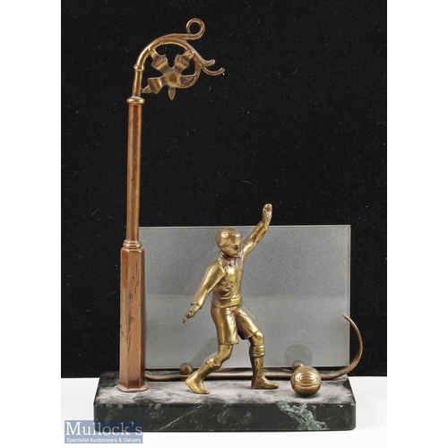 427 - 1930s Spelter and Marble Child Playing Football Lamp brass finished spelter lamp, with glass panel b... 