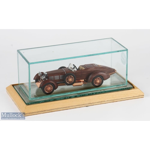 119 - Franklin Mint Hispano Suiza 1924 Tulipwood 1:24 Model Car 121165, with a glass display case on a woo... 