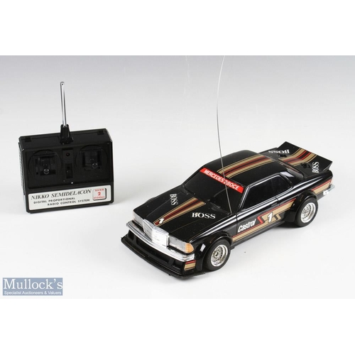 169 - Nikko Radio Controlled Mercedes Benz 280CE 1/14 Scale Car in black Boss livery with controller, boxe... 