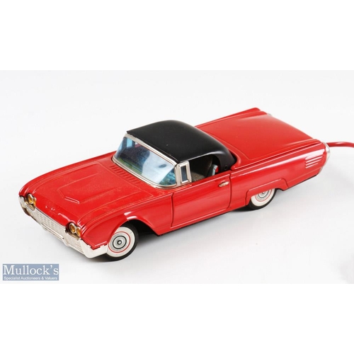 195 - Cragstan, Japan Tinplate Ford Thunderbird with retractable top, battery operated model in red, with ... 