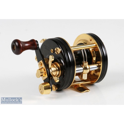 29 - ABU Ambassadeur 5500C Deluxe gold plated multiplier reel in black and gold finish, foot stamped 1500... 