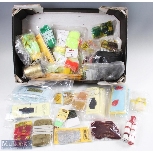 58 - A huge collection of synthetic tying materials to include Sparton Flexible Floss / Lureflash Floss /... 