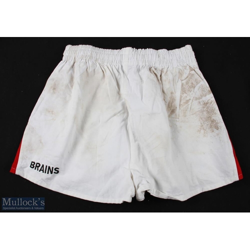 99 - 2000s Wales Match worn Rugby Shorts & Socks (2): Still bearing some mud marks, smart 'Reebok' Wales ... 