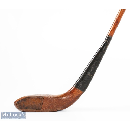 99 - Auchterlonie St Andrews light stained dog wood broad head longnose driver c1890 - with half leather ... 