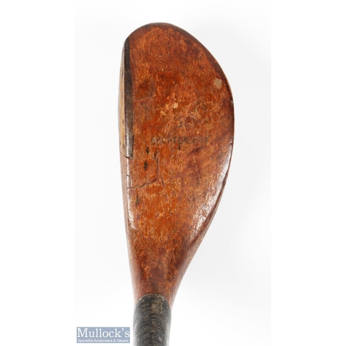 99 - Auchterlonie St Andrews light stained dog wood broad head longnose driver c1890 - with half leather ... 