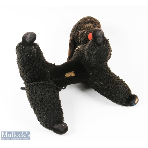 39 - 1950s Merrythought Toy Pet Poodle Dog with Musical wind-up tail, in working condition, with signs of... 