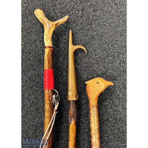 174 - 3x Walking Sticks one with antler top, another with carved bird top and the other with brass boating... 