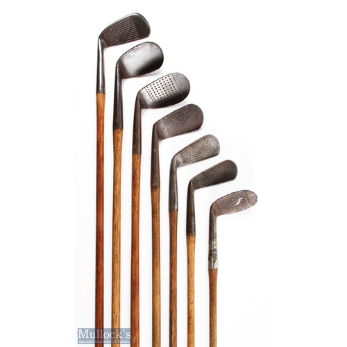 521 - 7x Assorted Irons incl Gibson for J Robinson of Sale GC niblick with punch dot face markings, Forgan... 