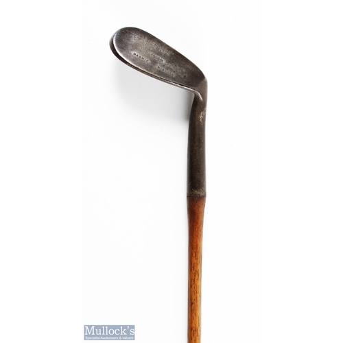 534 - Bussey & Co London mashie niblick showing the maker's arrow cleek mark and unusual face markings, fi... 