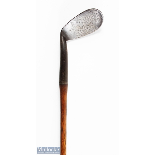 534 - Bussey & Co London mashie niblick showing the maker's arrow cleek mark and unusual face markings, fi... 