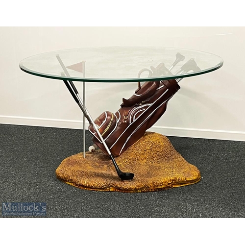 669 - Golf Themed Glass Toped Coffee Table - a bevelled edges glass top resting on a set of golf clubs, wi... 