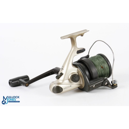 Daiwa 5500T fixed spool spinning reel, good bail, coil spring loaded drag,  runs very well, light use