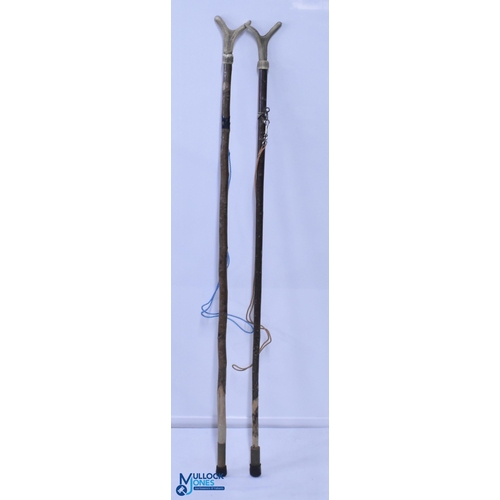 1104 - Pair of Wading Sticks, with antler grips, nylon belt fastening and brass ferrules, #147cm long (2)