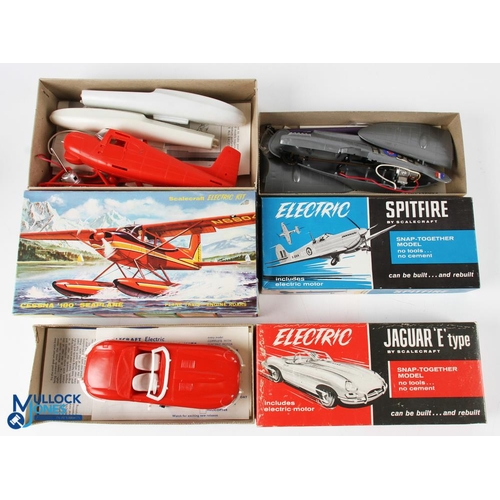 229 - 3x Scalecraft Electric Kits, models of Cessna 180 seaplane, Spitfire and Jaguar E type, all part bui... 