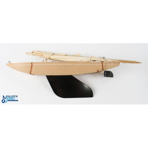 236 - Bowman Racing Yacht, a wooden toy model in good condition, plus a boxed The Sprite electric outboard... 